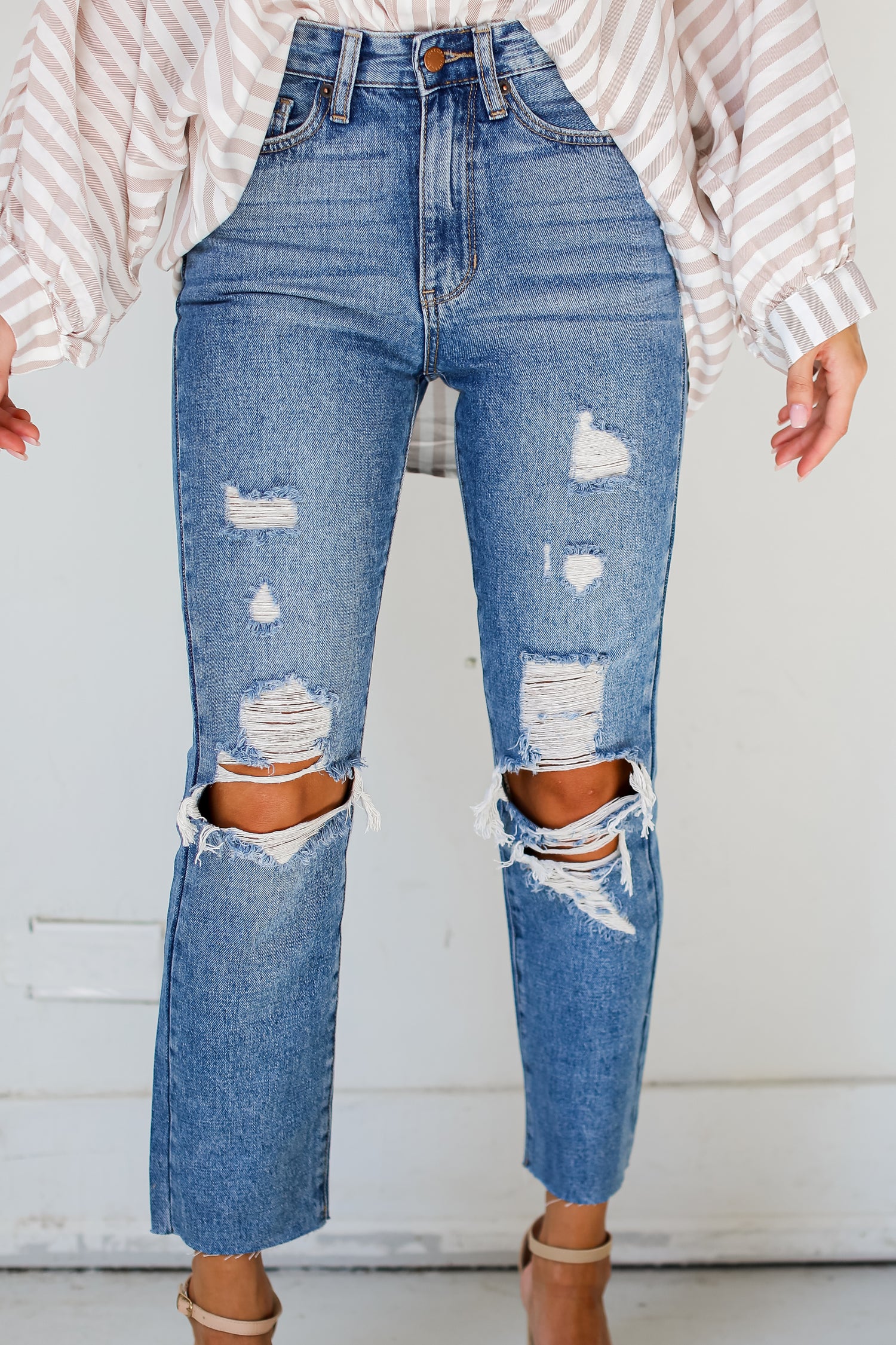 medium wash Distressed Mom Jeans close up