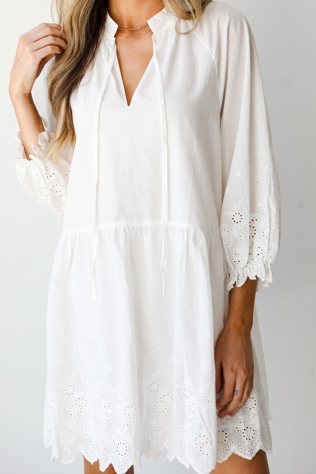 white Tiered Eyelet Mini Dress close up