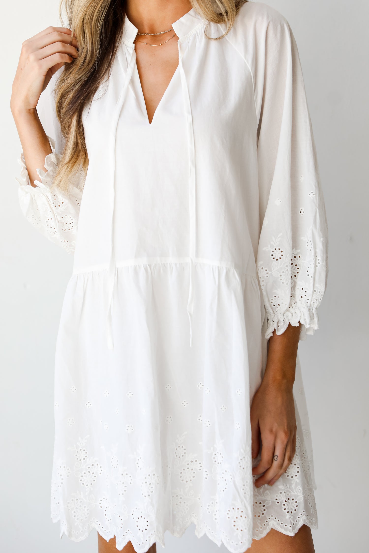 white Tiered Eyelet Mini Dress close up