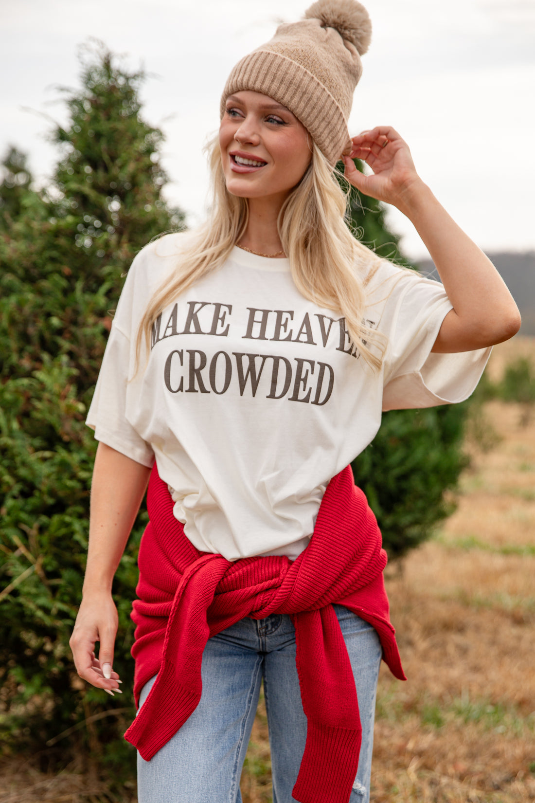 Woman wearing a white t-shirt with &