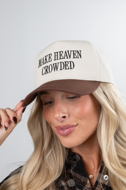Woman wearing a beige cap with &
