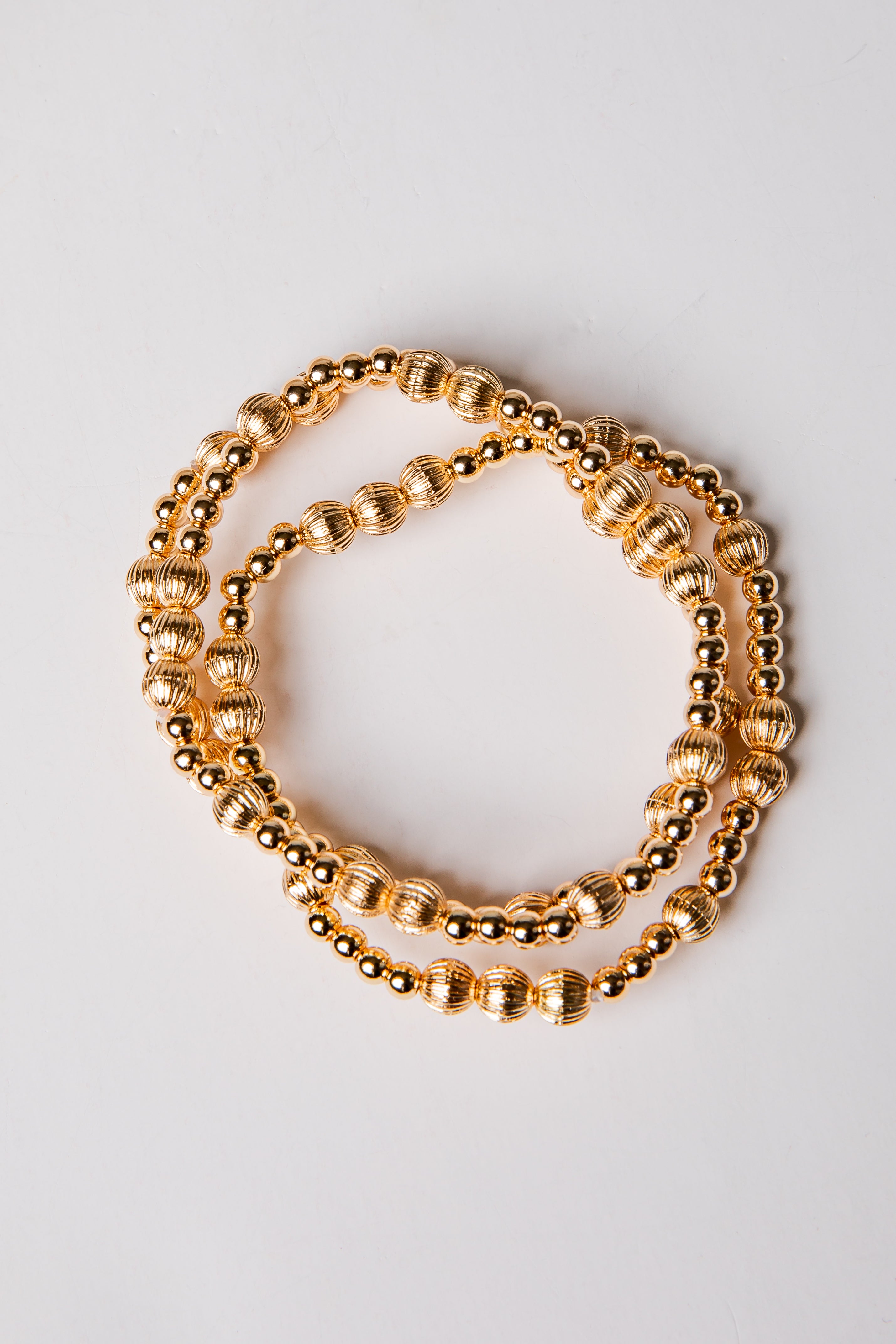 set of 3 gold beaded bracelets