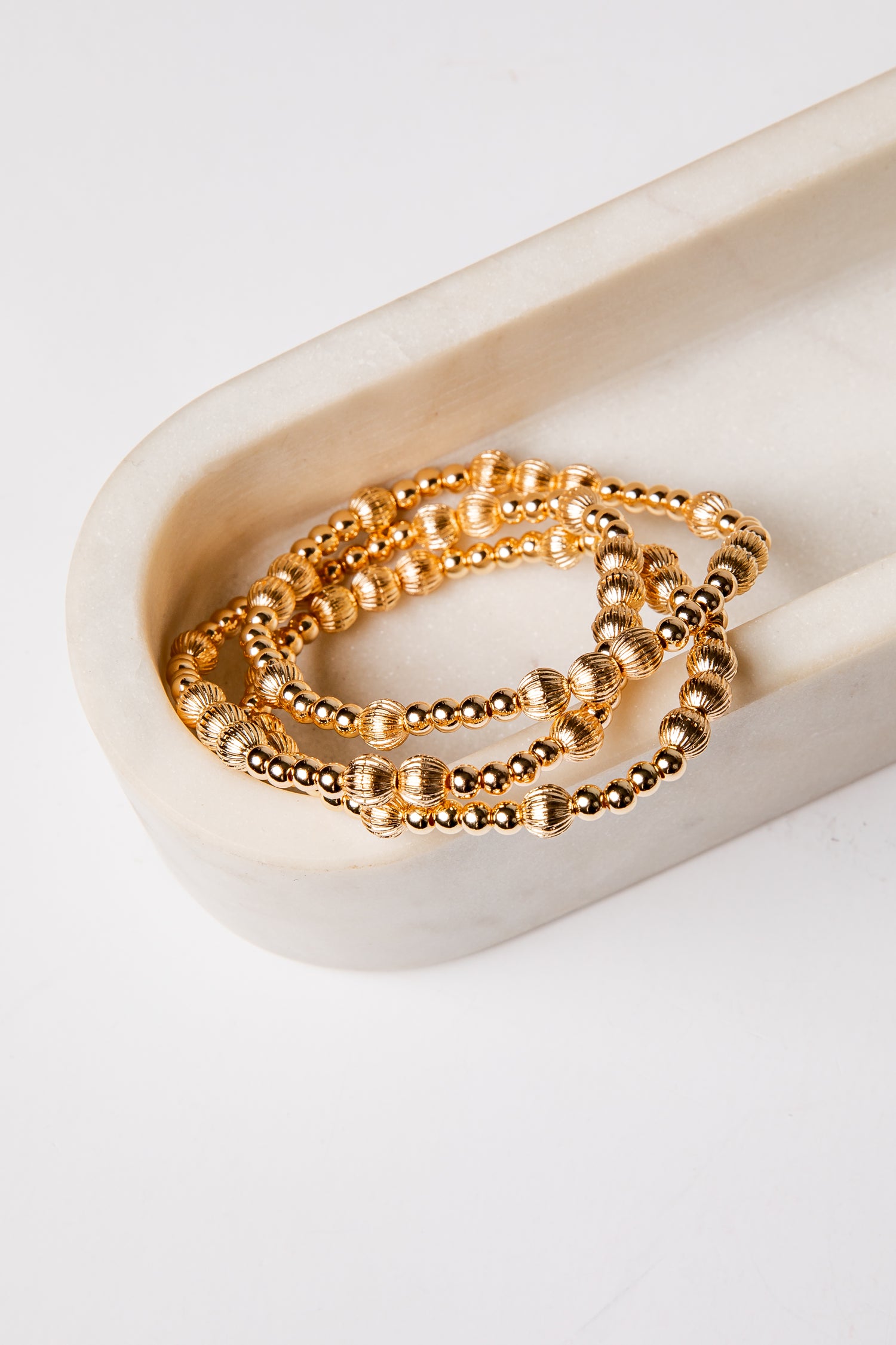 set of 3 gold beaded bracelets