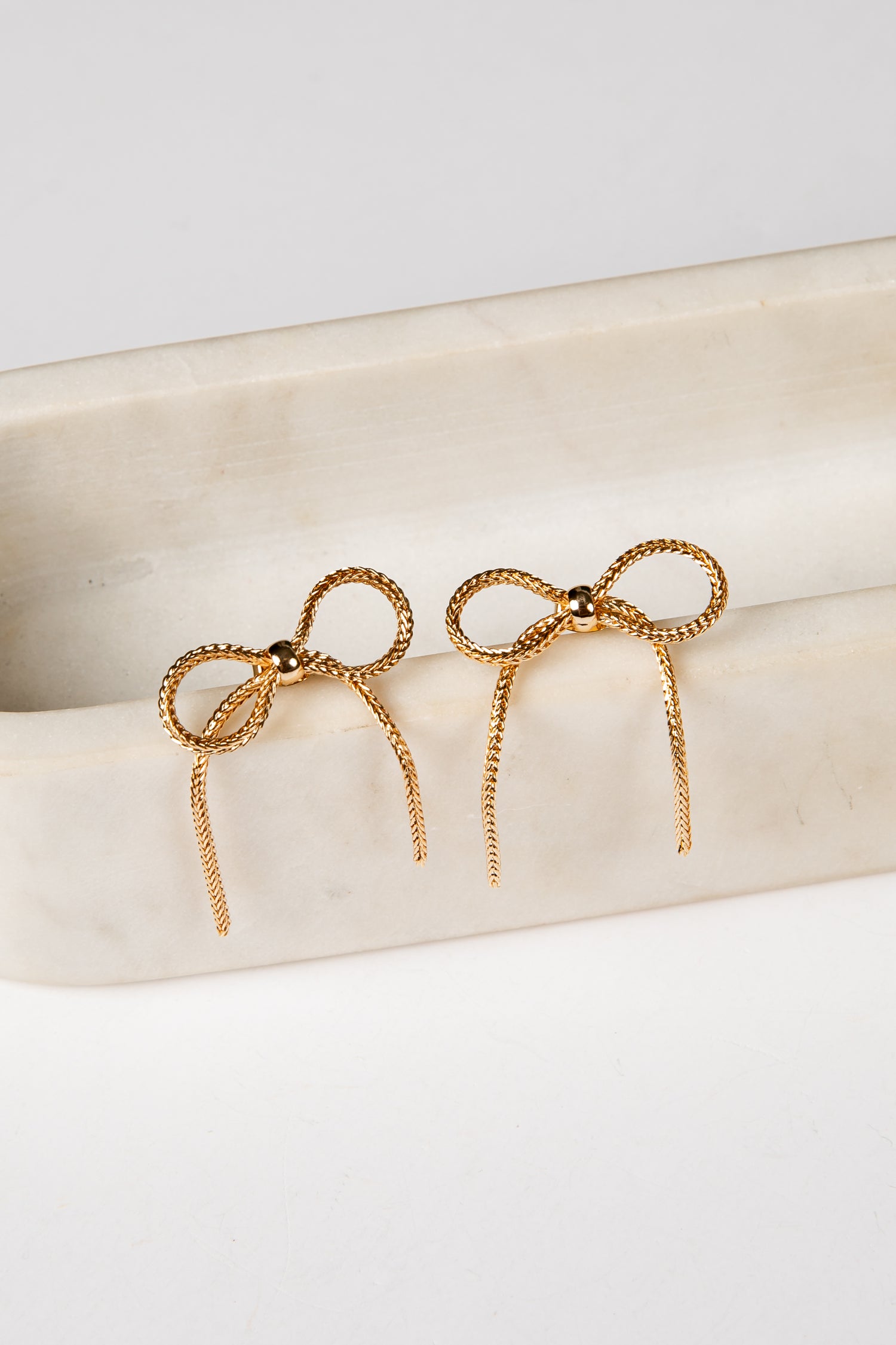 gold bow earrings