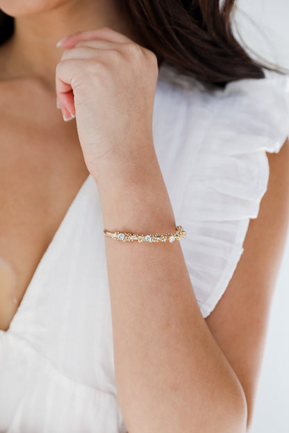 Gold Rhinestone Cuff Bracelet on model