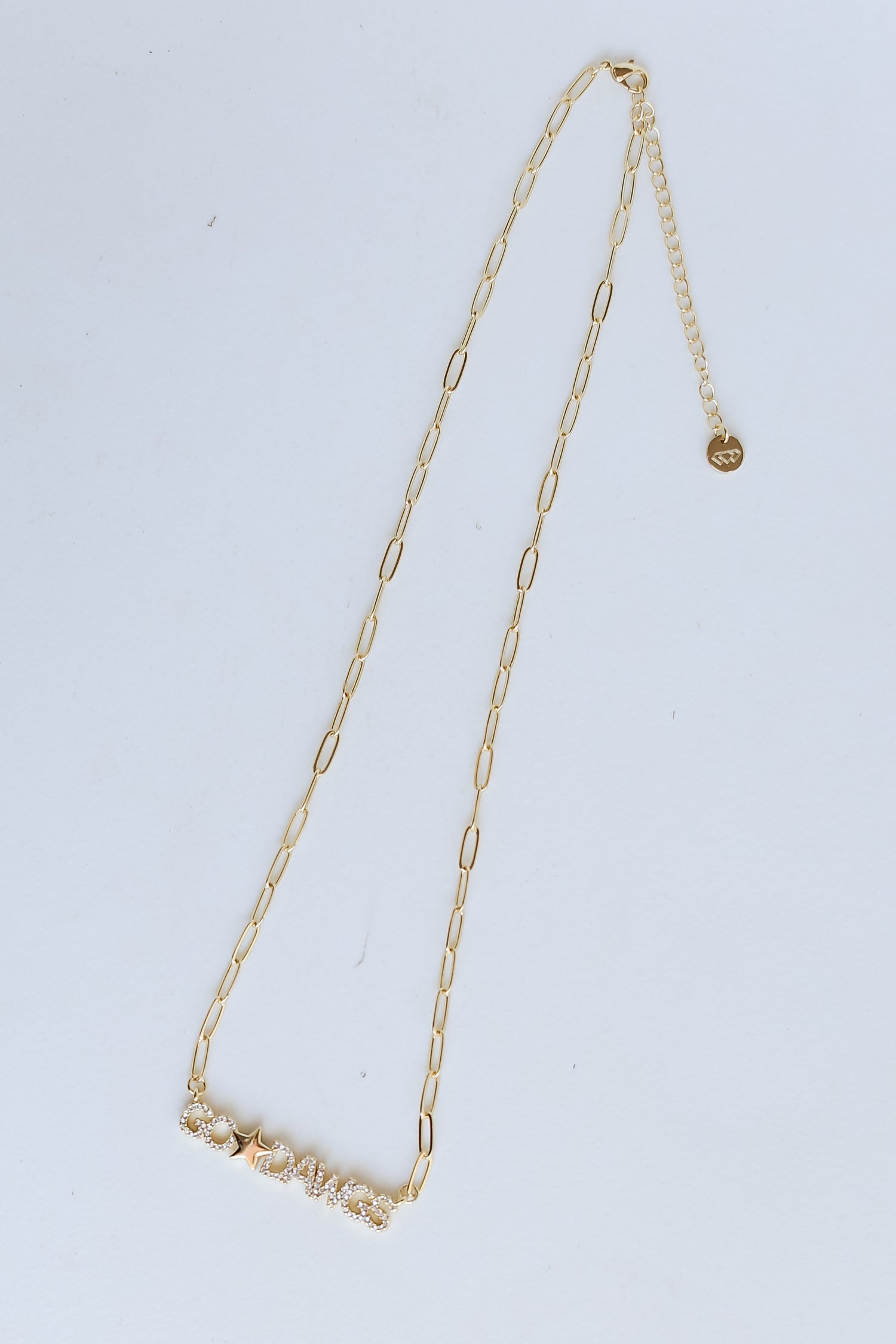 Gold Go Dawgs Necklace flat lay