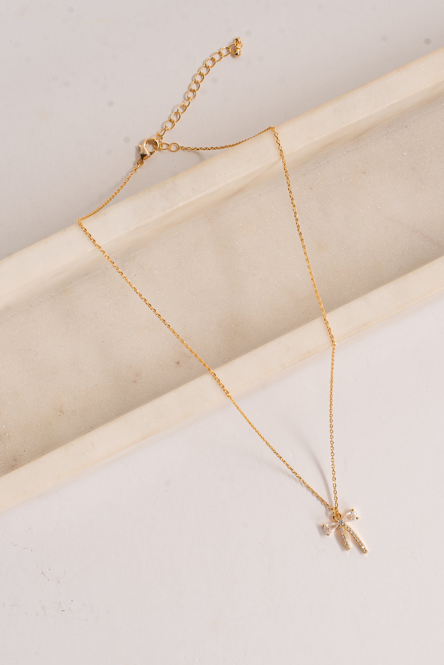 Charlie Gold Rhinestone Bow Charm Necklace