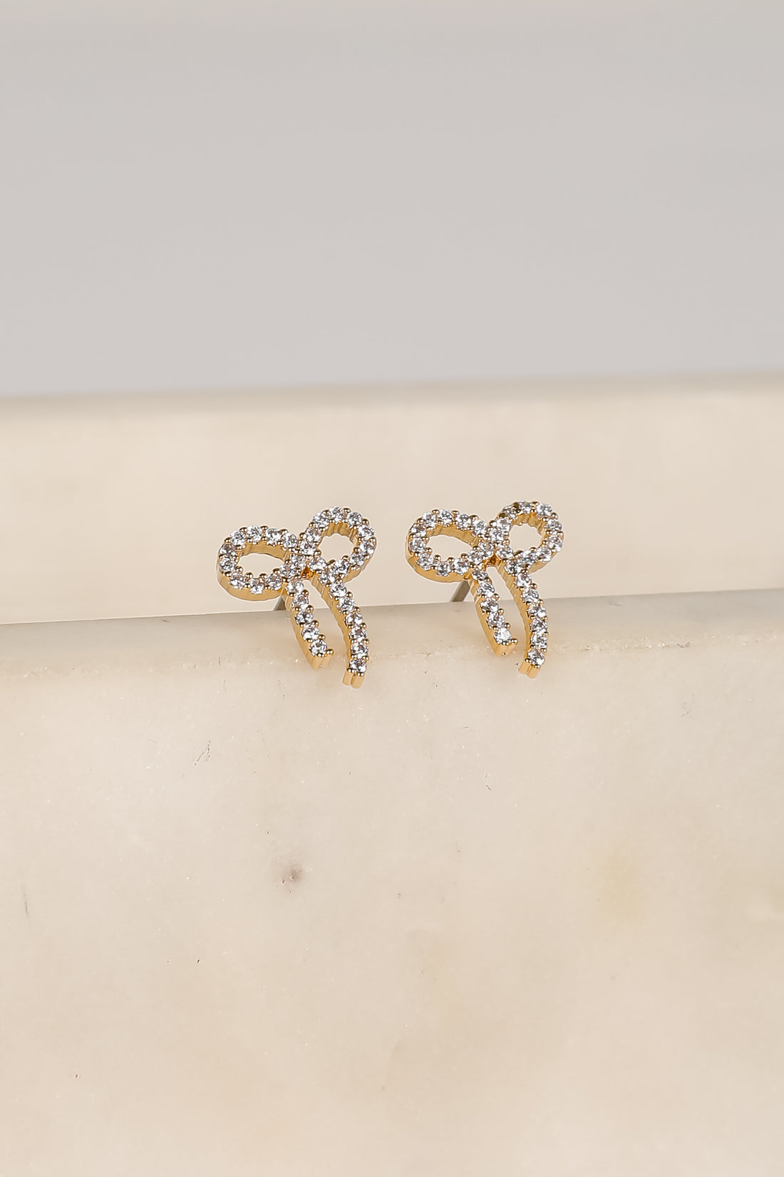 Daniella Gold Rhinestone Bow Earrings