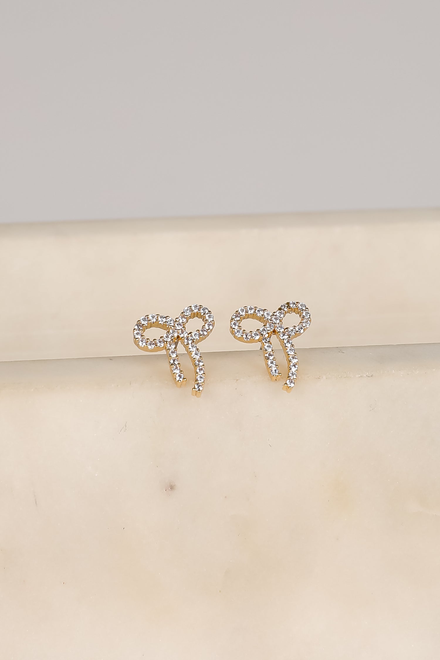 Daniella Gold Rhinestone Bow Earrings