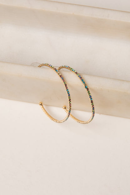 Two beaded bracelets on a beige surface