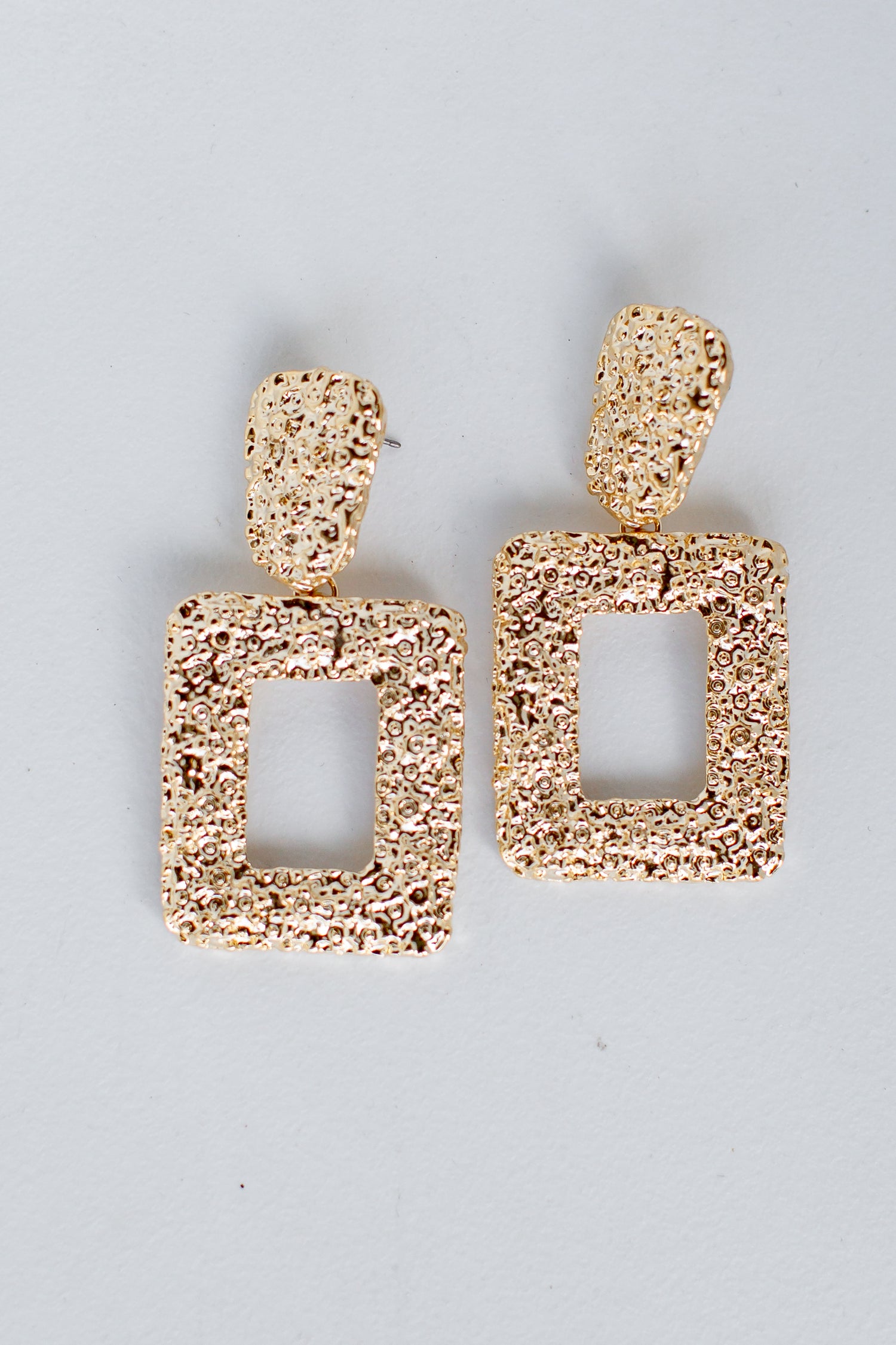 Gold Hammered Statement Earrings flat lay