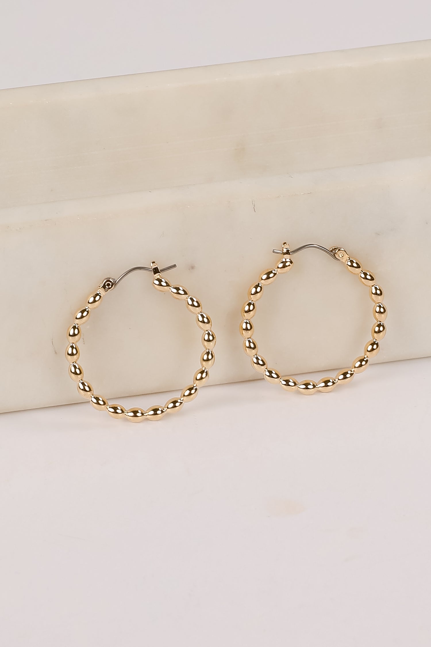 Ava Gold Textured Hoop Earrings