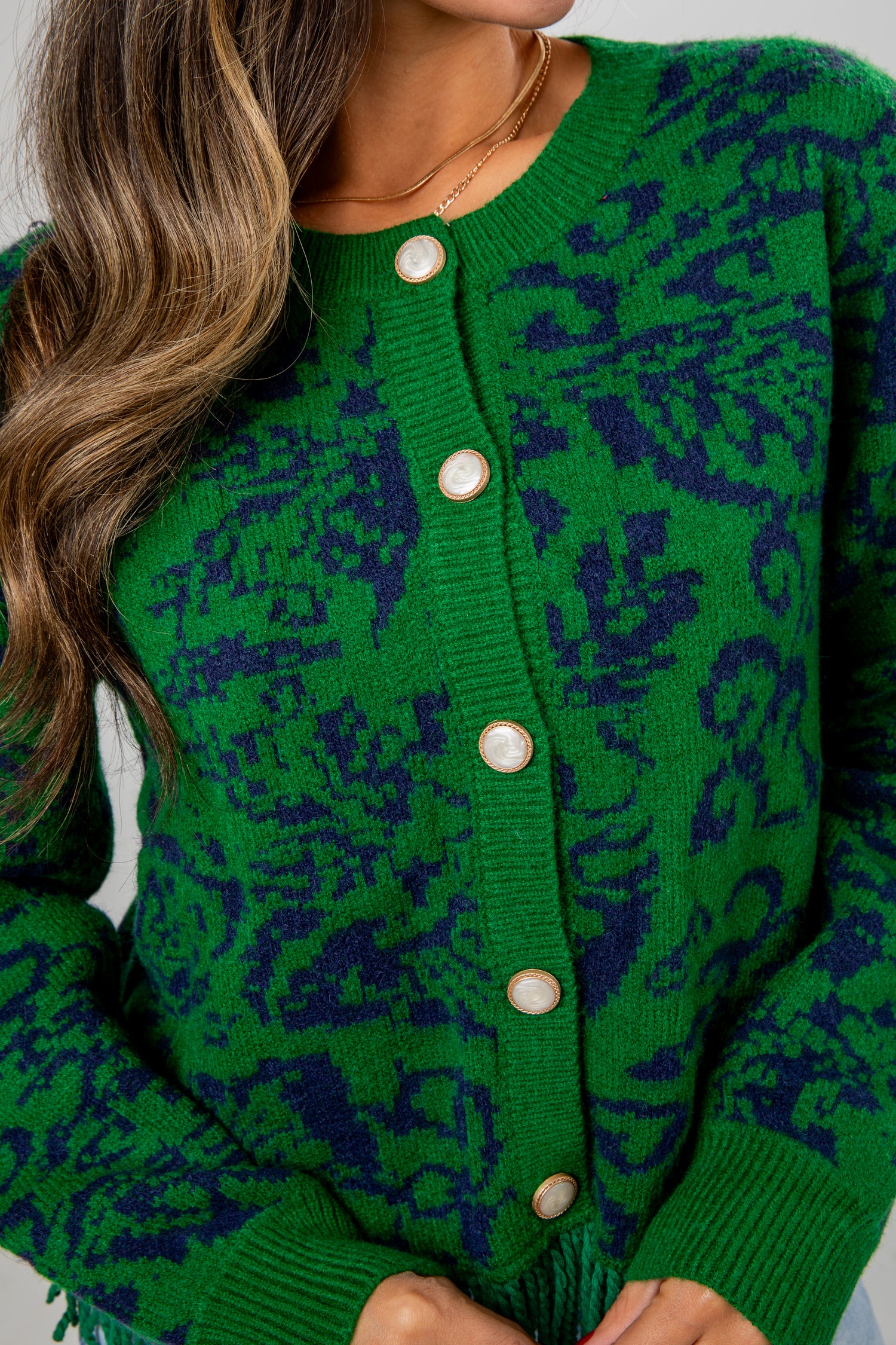 green fringe sweater