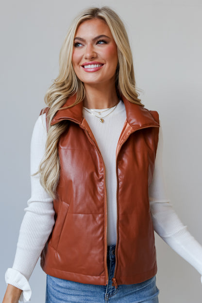 brown leather vest