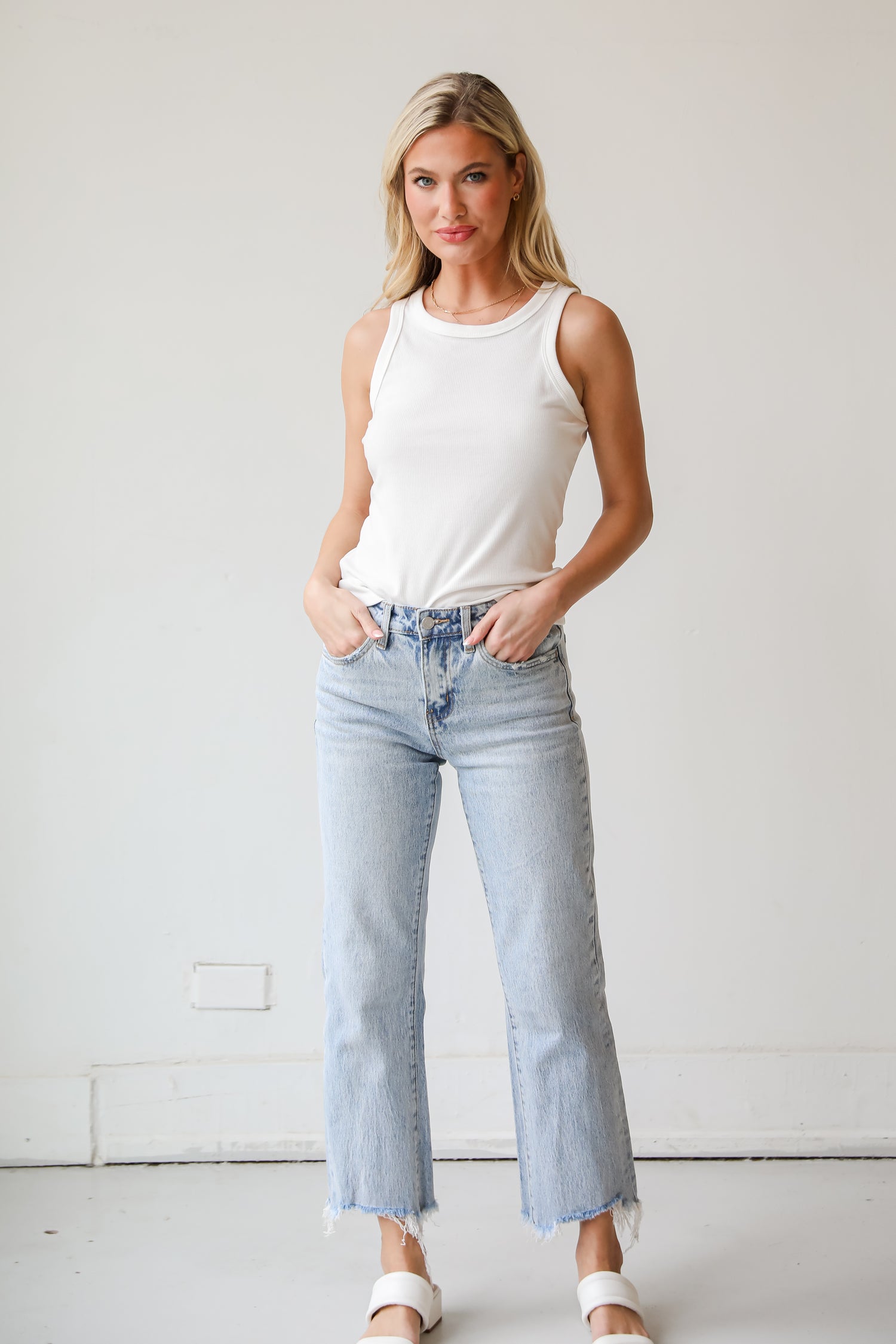 Kendall Light Wash Distressed Dad Jeans are high rise, classic 5- pocked cut, spring denim. vervet denim jeans