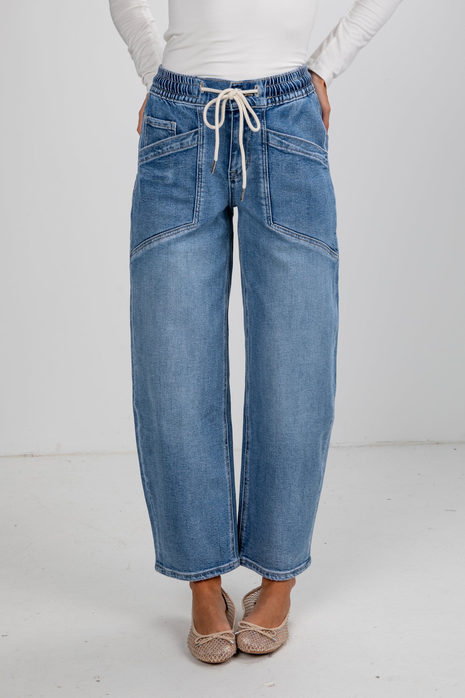 Blue jeans with a white background