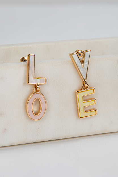 Gold earrings spelling &