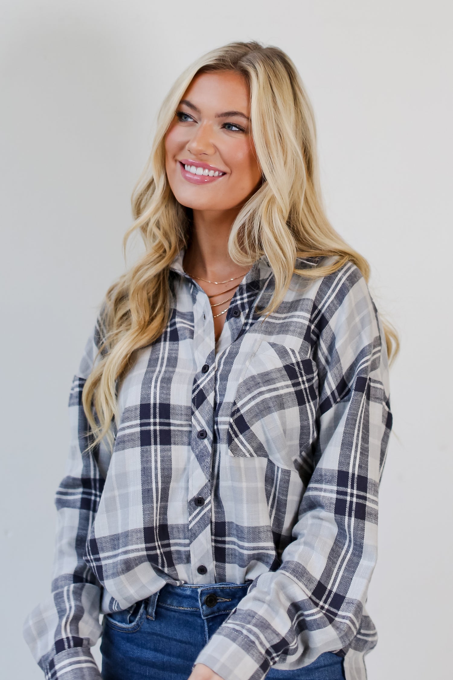 model wearing a navy blue Plaid Flannel