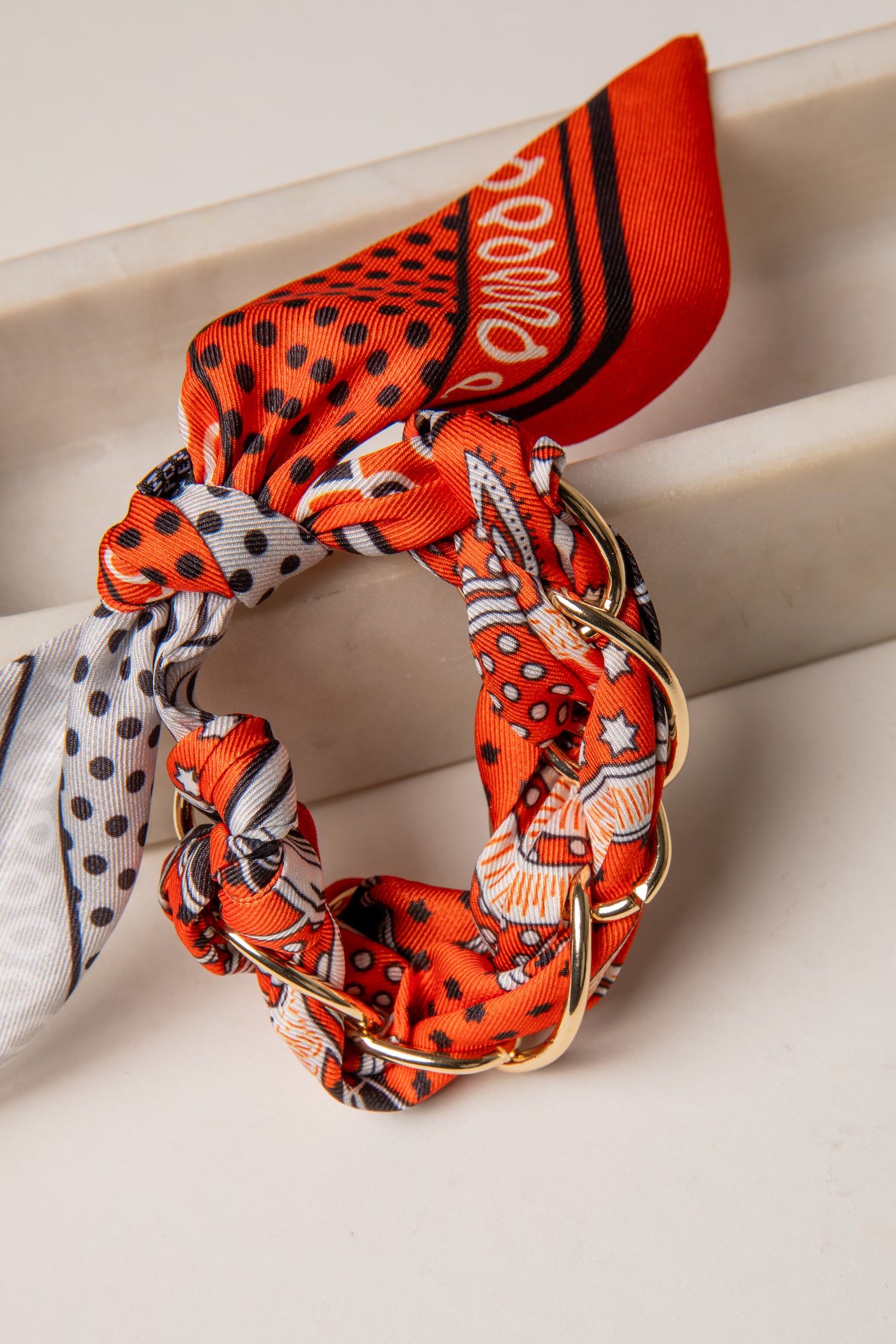 Set of colorful scrunchies with patterns on a light background