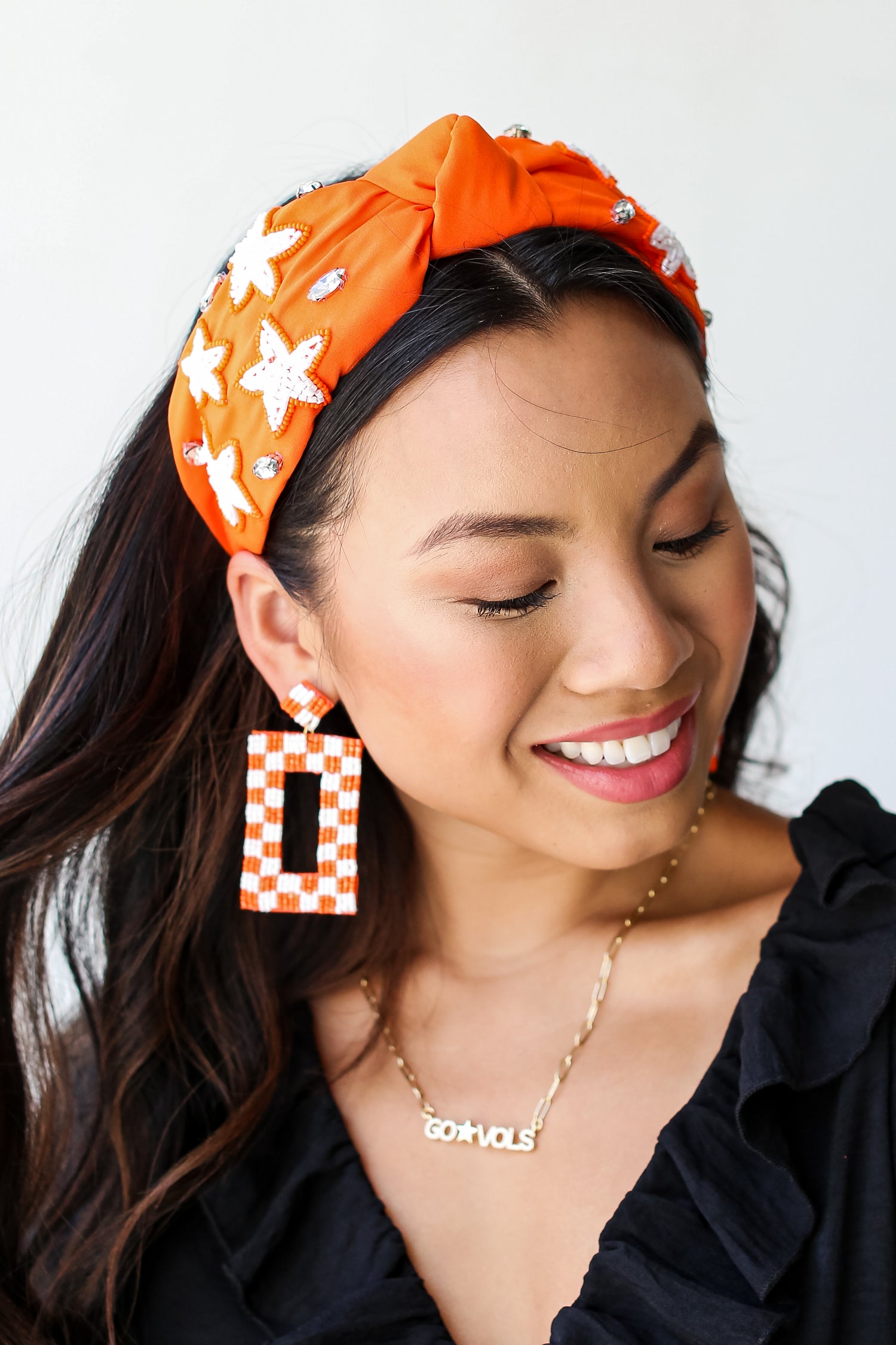 Orange Star + Gemstone Knotted Headband on model