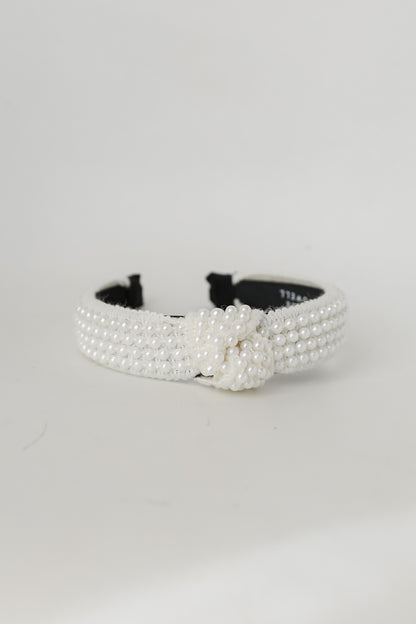 Ivory Pearl Knotted Headband flat lay