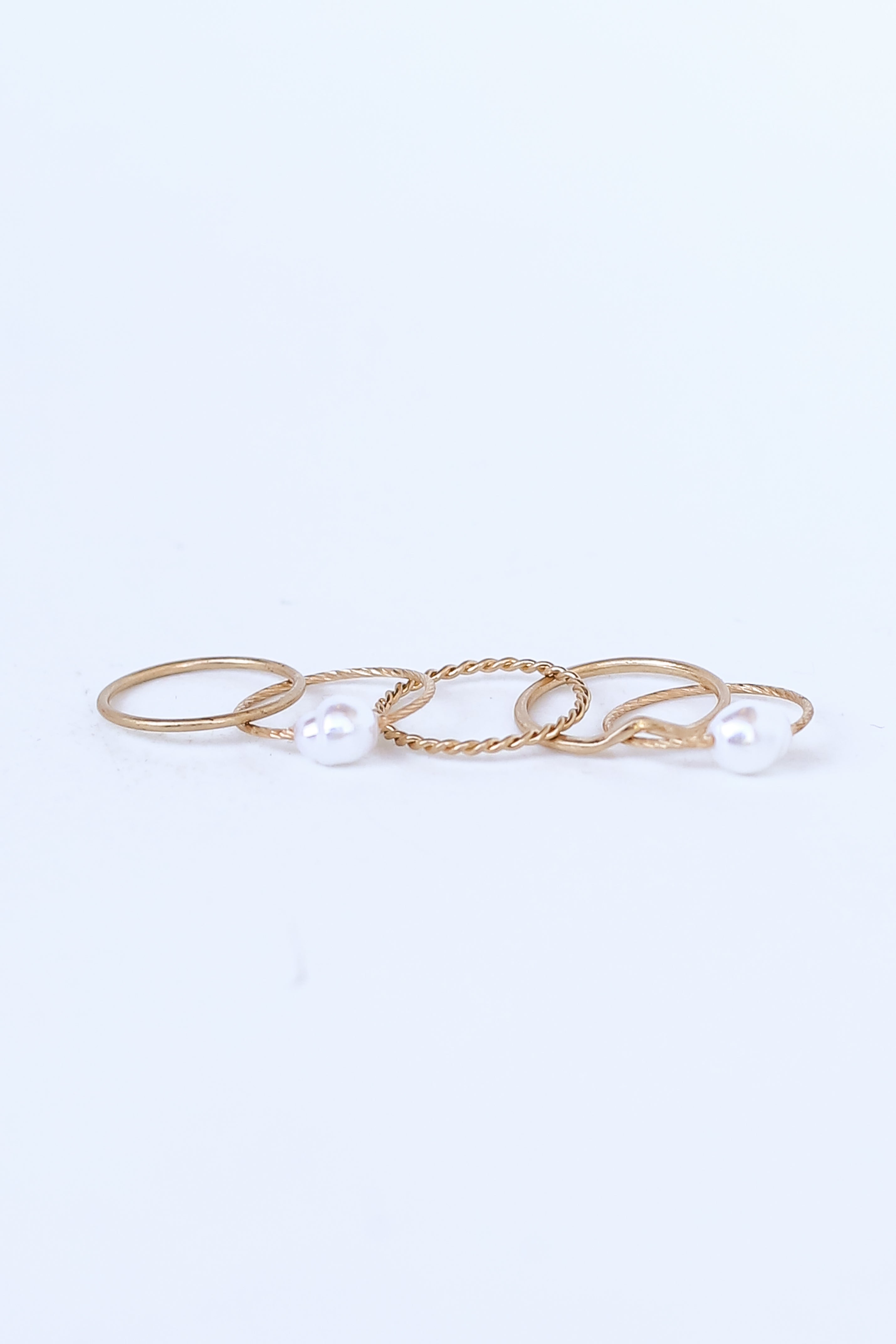 Gold Pearl Ring Set flat lay