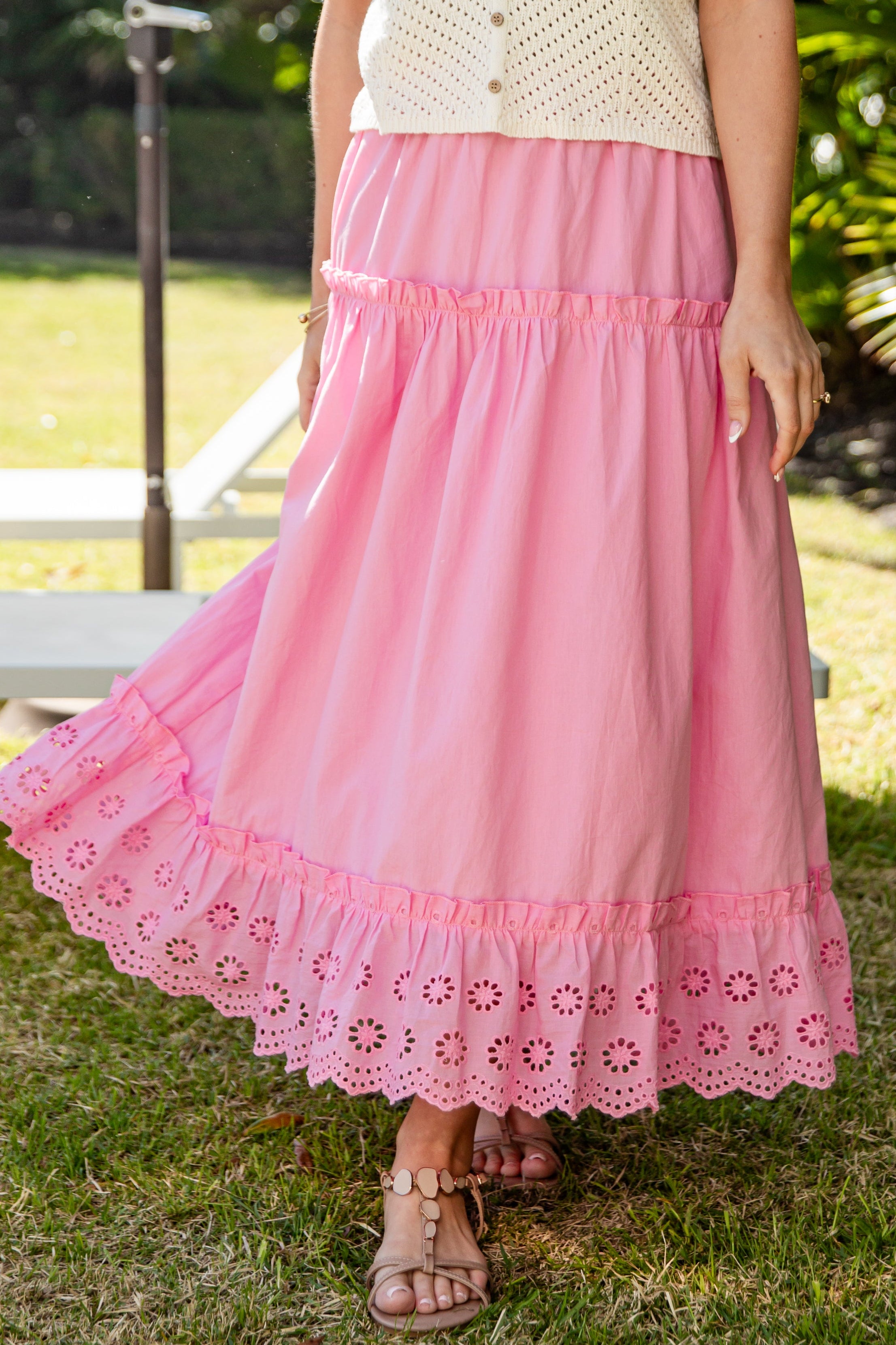 Pink lace-trim maxi skirt styled in sunshine