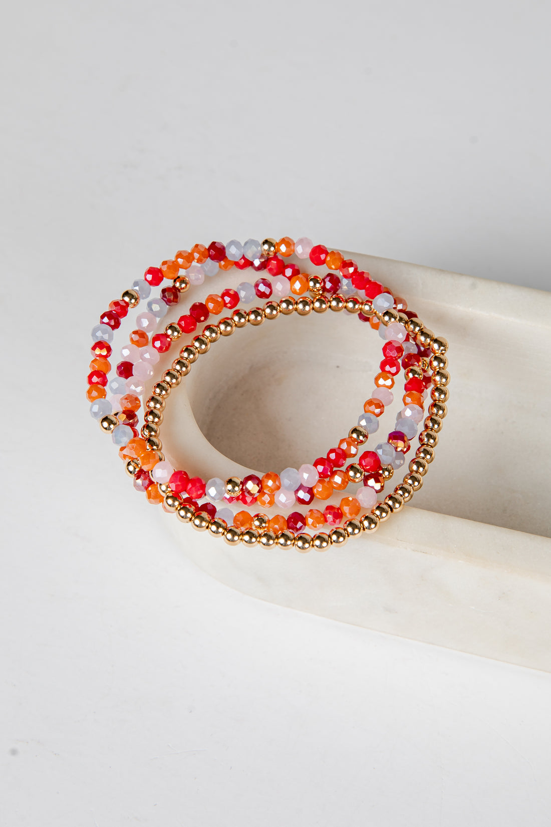 Multicolored beaded bracelet on a white surface