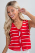 Woman wearing a red and white striped sleeveless top on a plain background