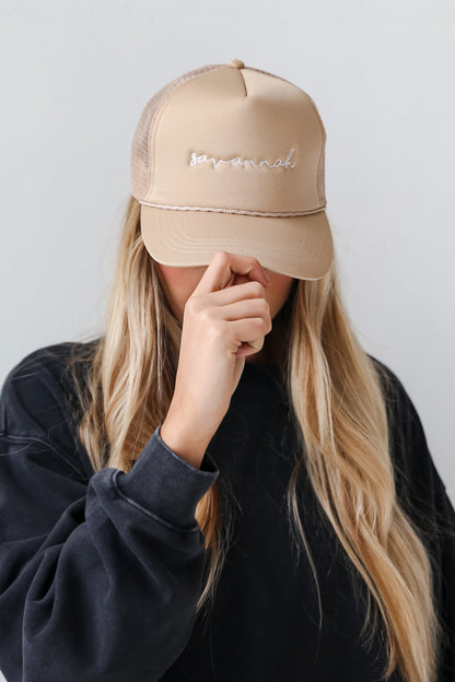 Beige Savannah Trucker Hat on dress up model