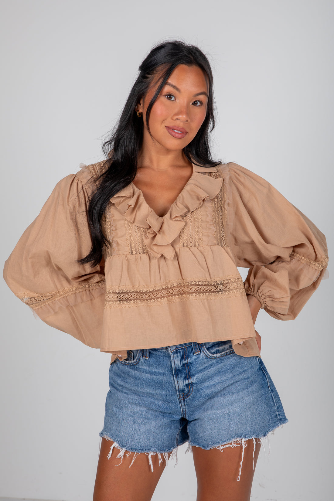 taupe ruffle blouse