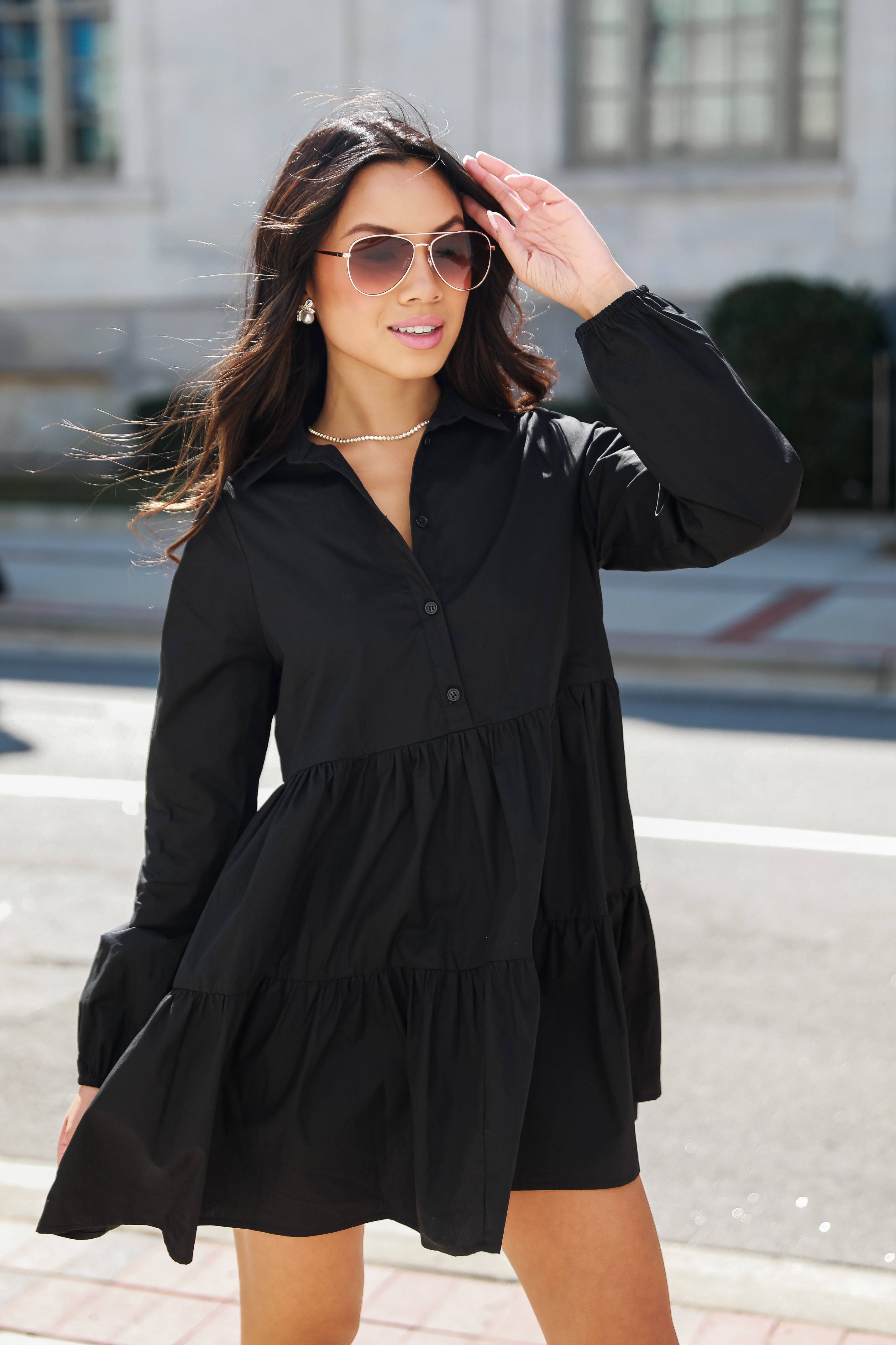 black Tiered Mini Dress on model