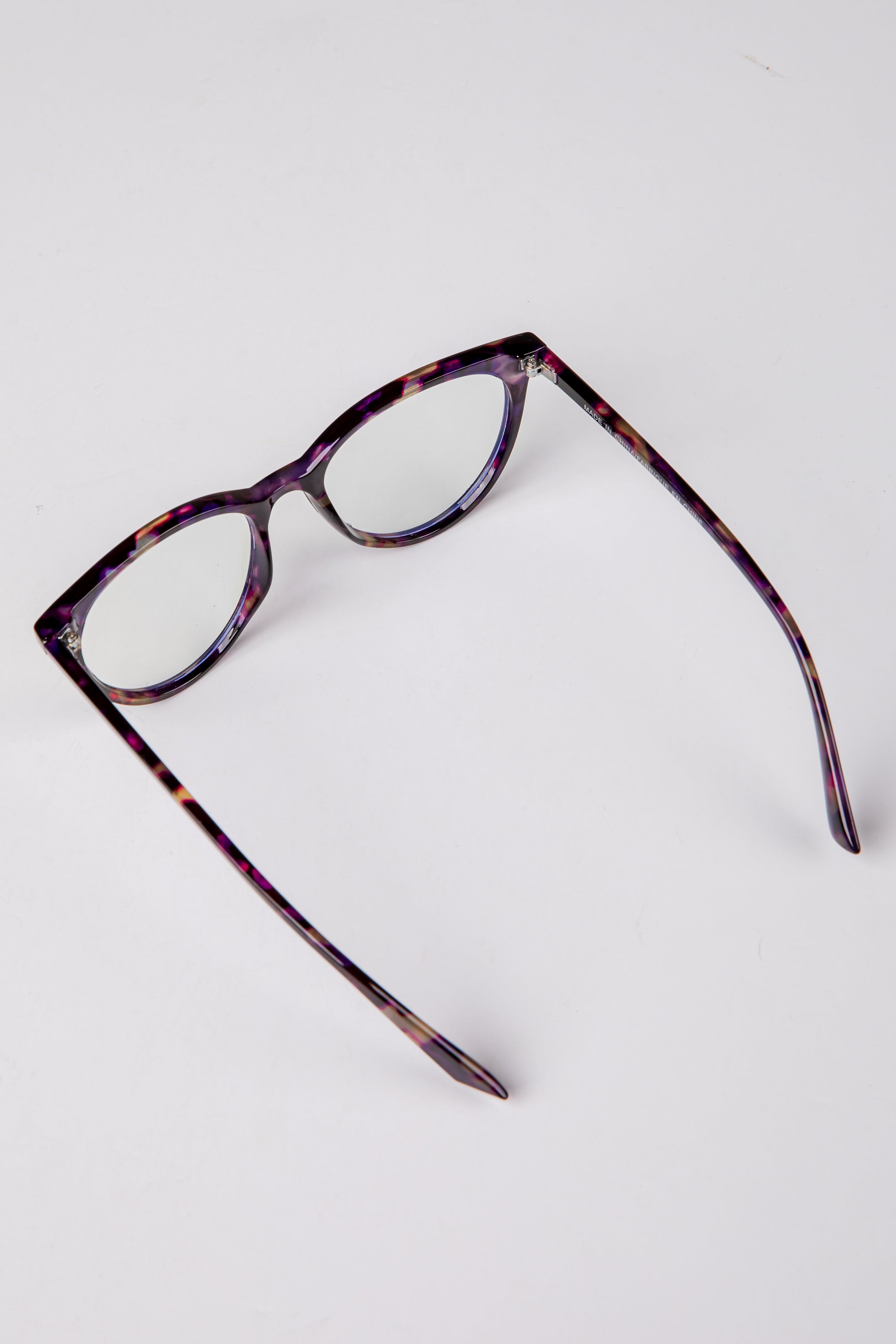Tortoiseshell eyeglasses on a white background
