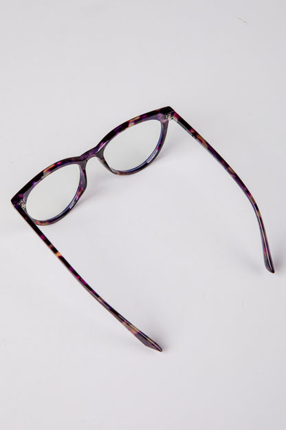 Tortoiseshell eyeglasses on a white background
