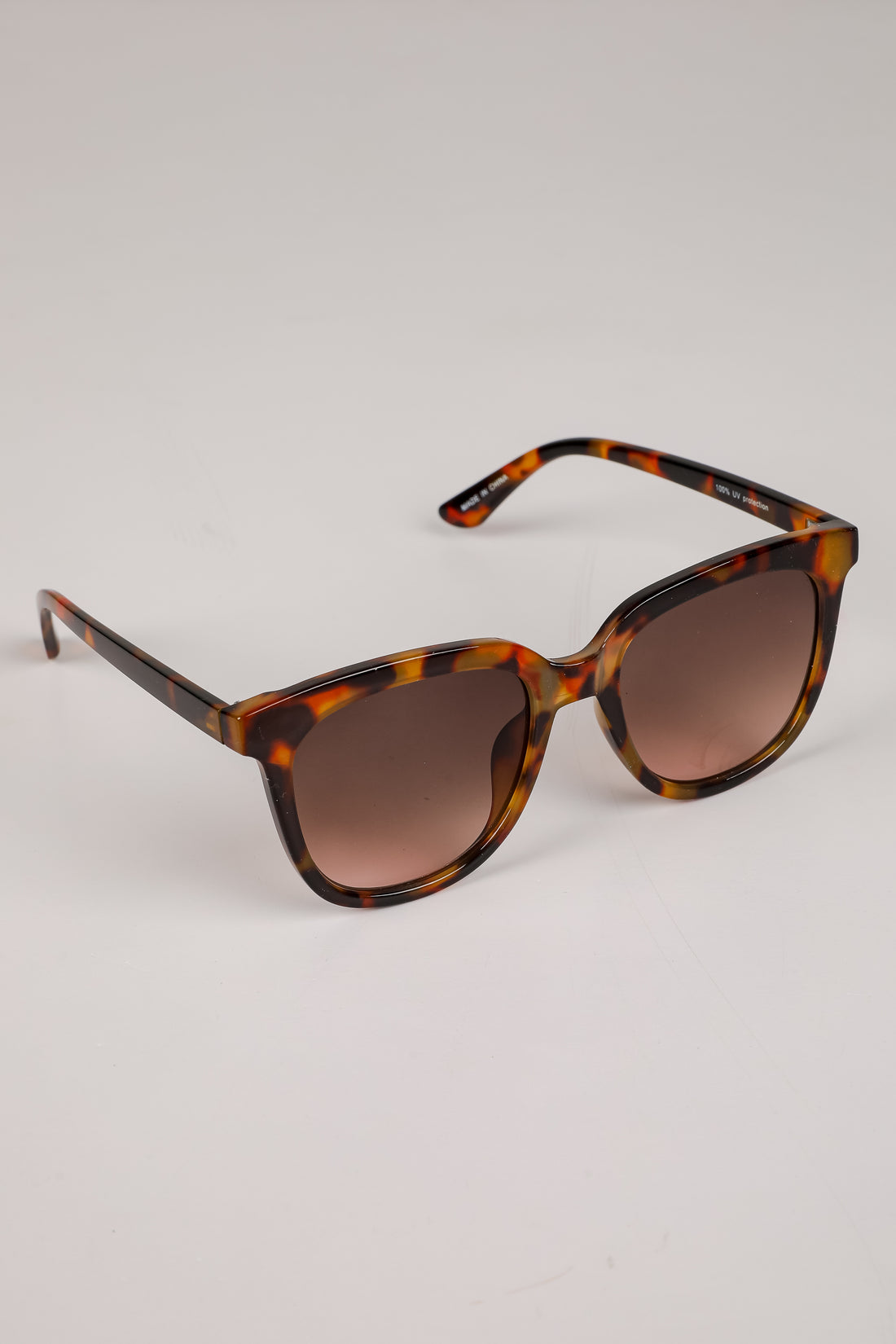Glistening Lights Tortoise Round Sunglasses