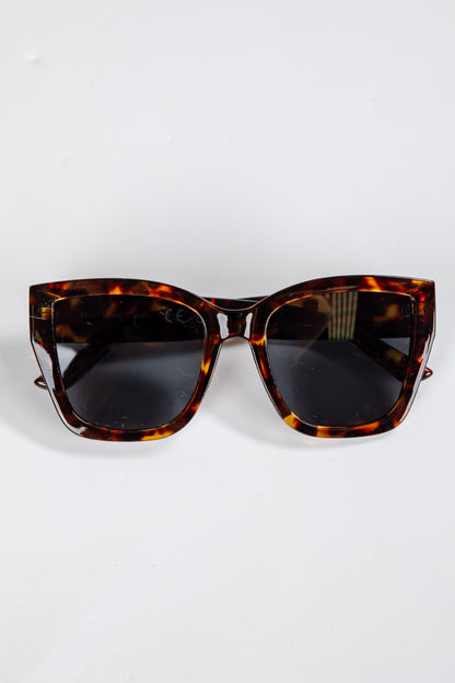 Tortoiseshell sunglasses on a white background