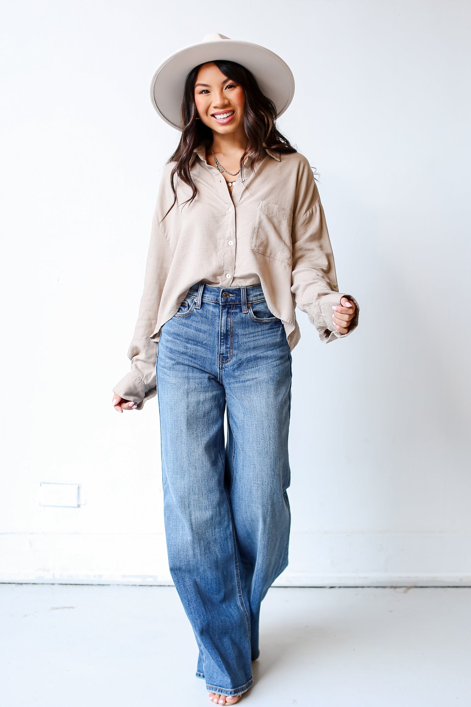 medium wash Wide Leg Jeans on dress up model