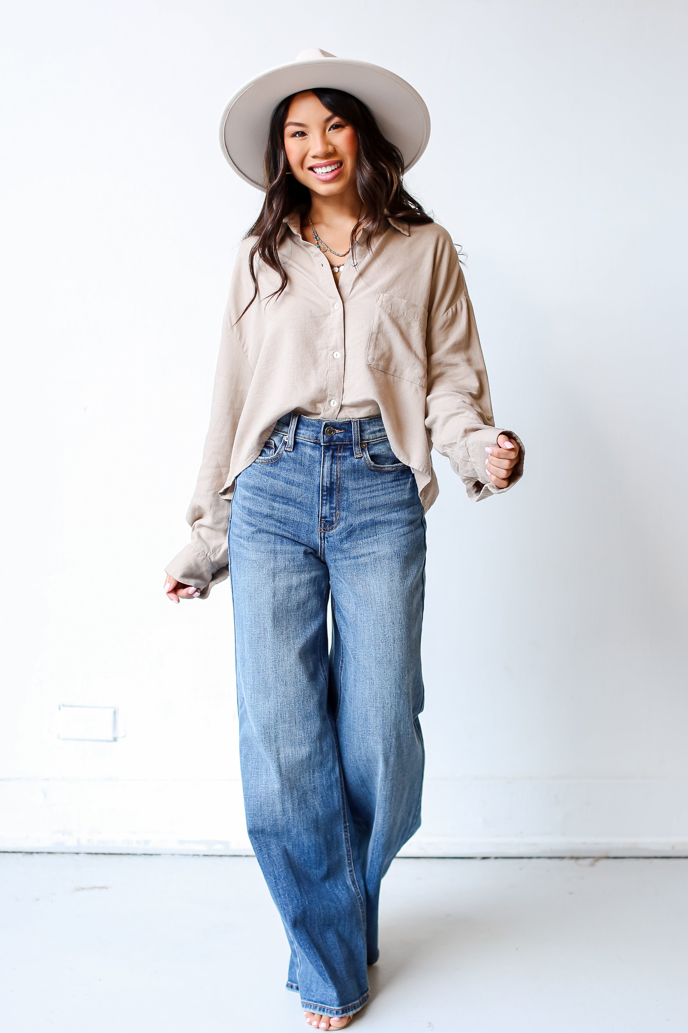 medium wash Wide Leg Jeans on dress up model
