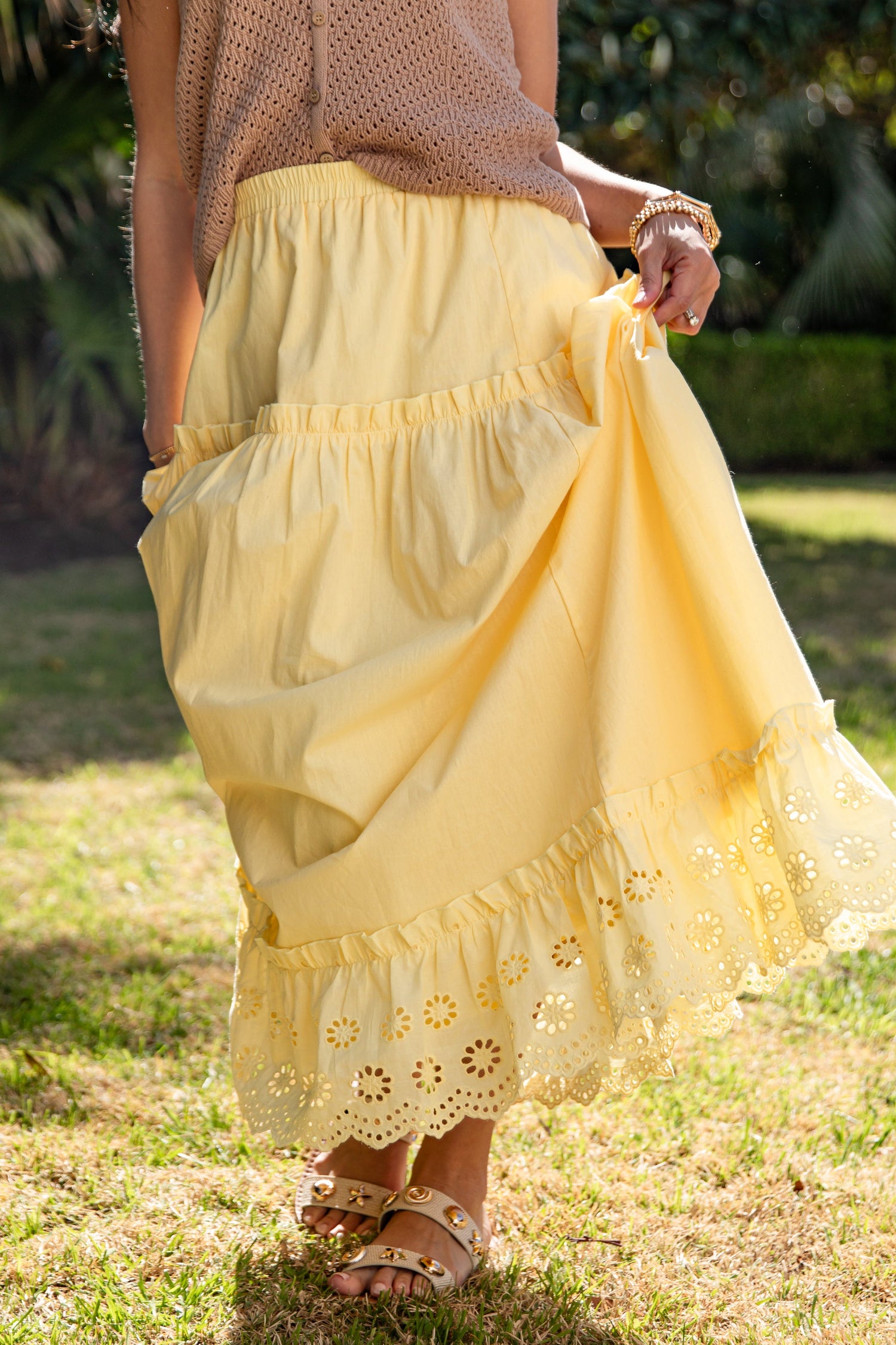 Yellow lace-trim maxi skirt in natural light