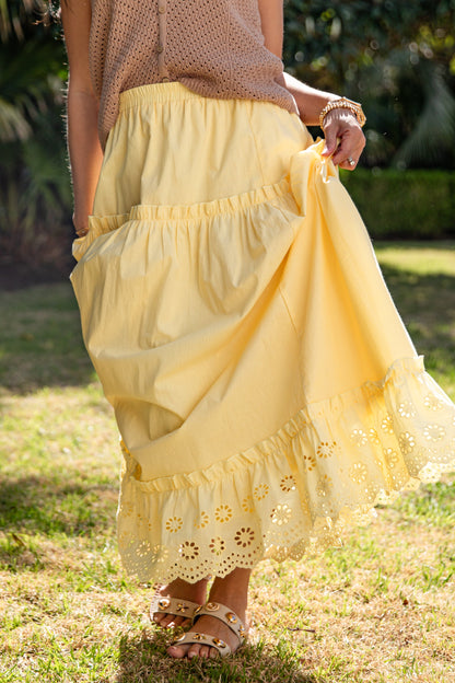 Yellow lace-trim maxi skirt in natural light