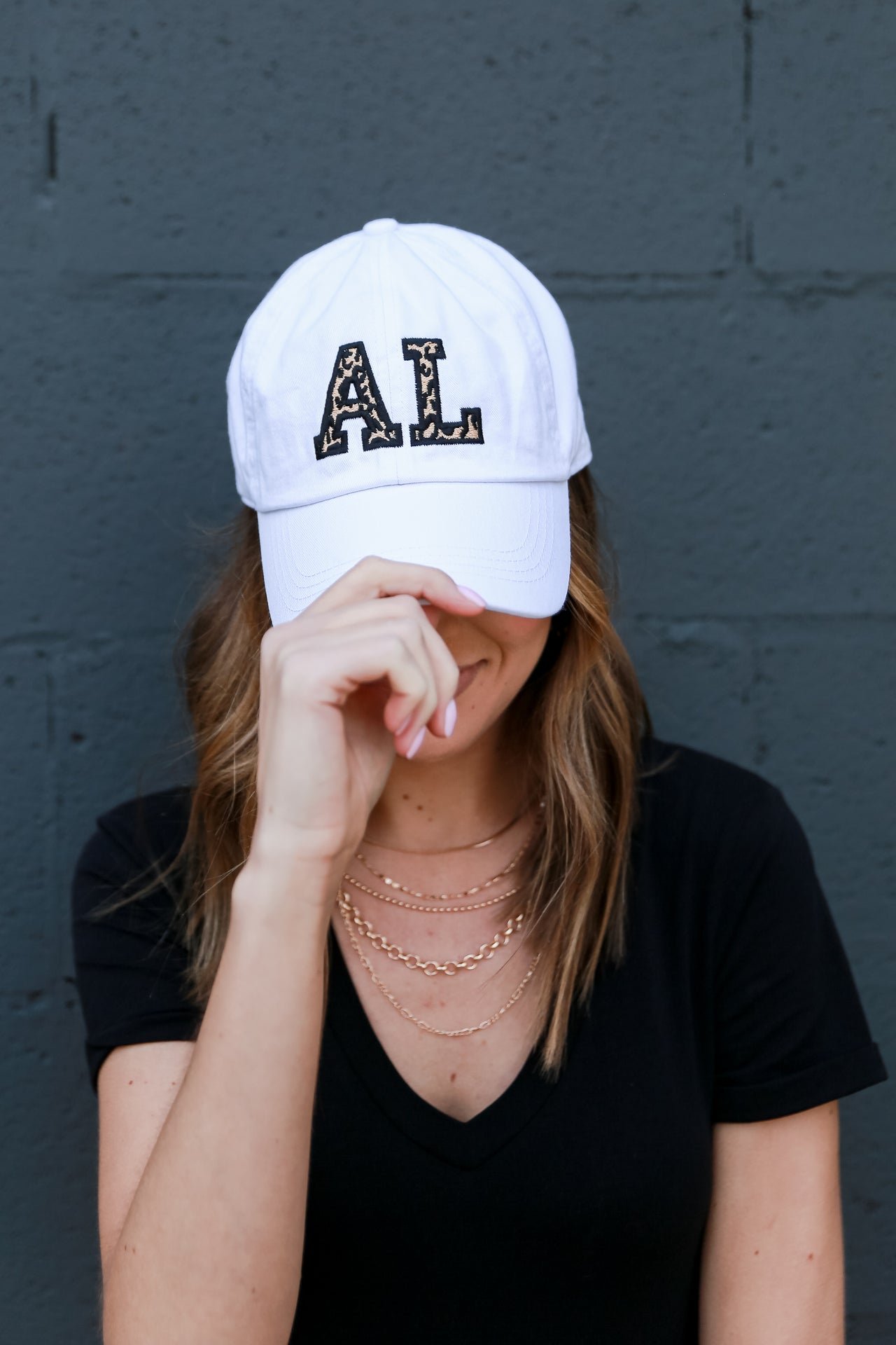 Model Wearing Alabama Leopard Hat 