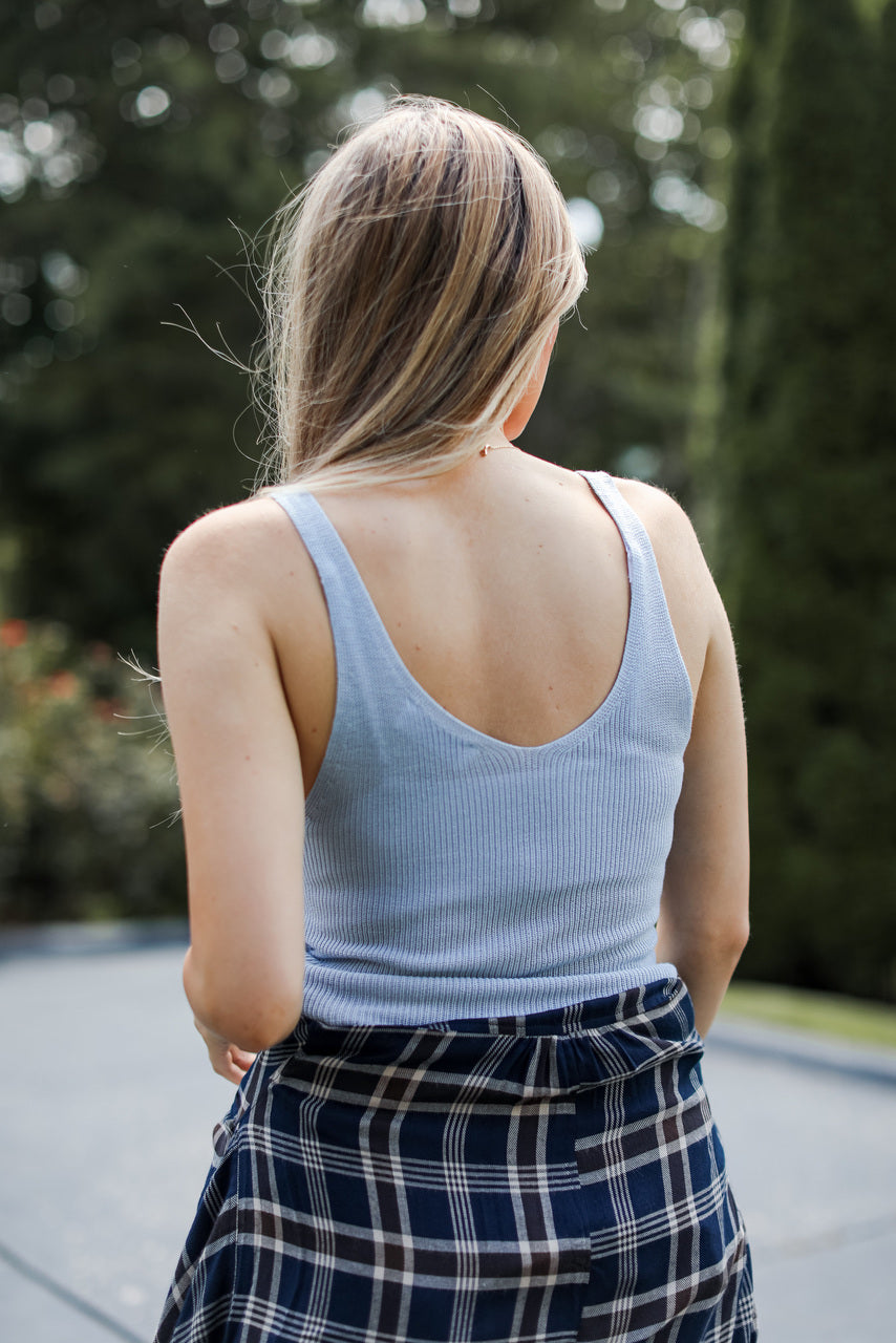 back view of model wearing light blue knit tank