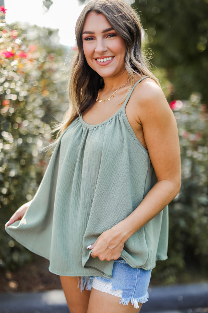 front view of model wearing olive tank