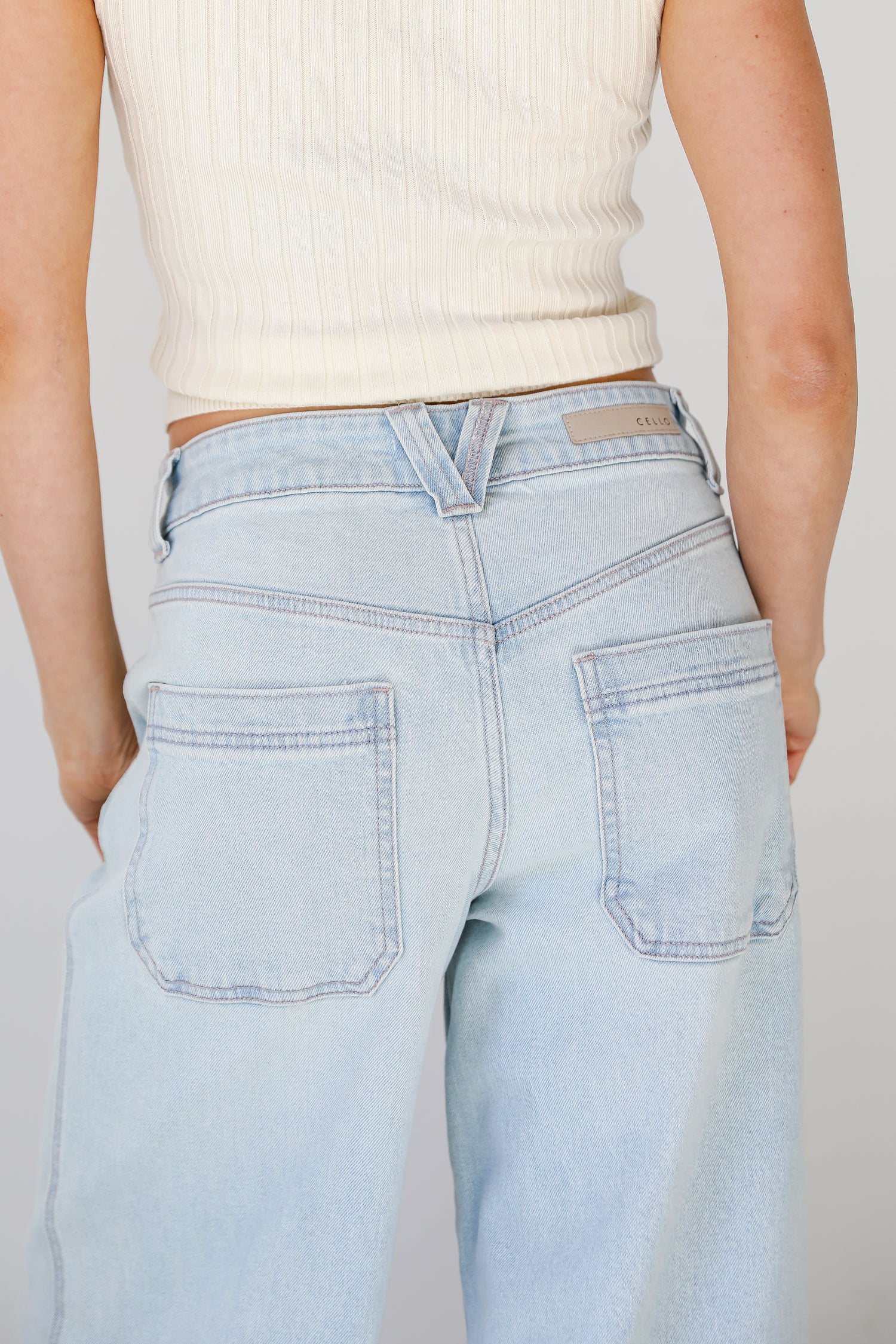 light wash baggy skater jeans back view close up