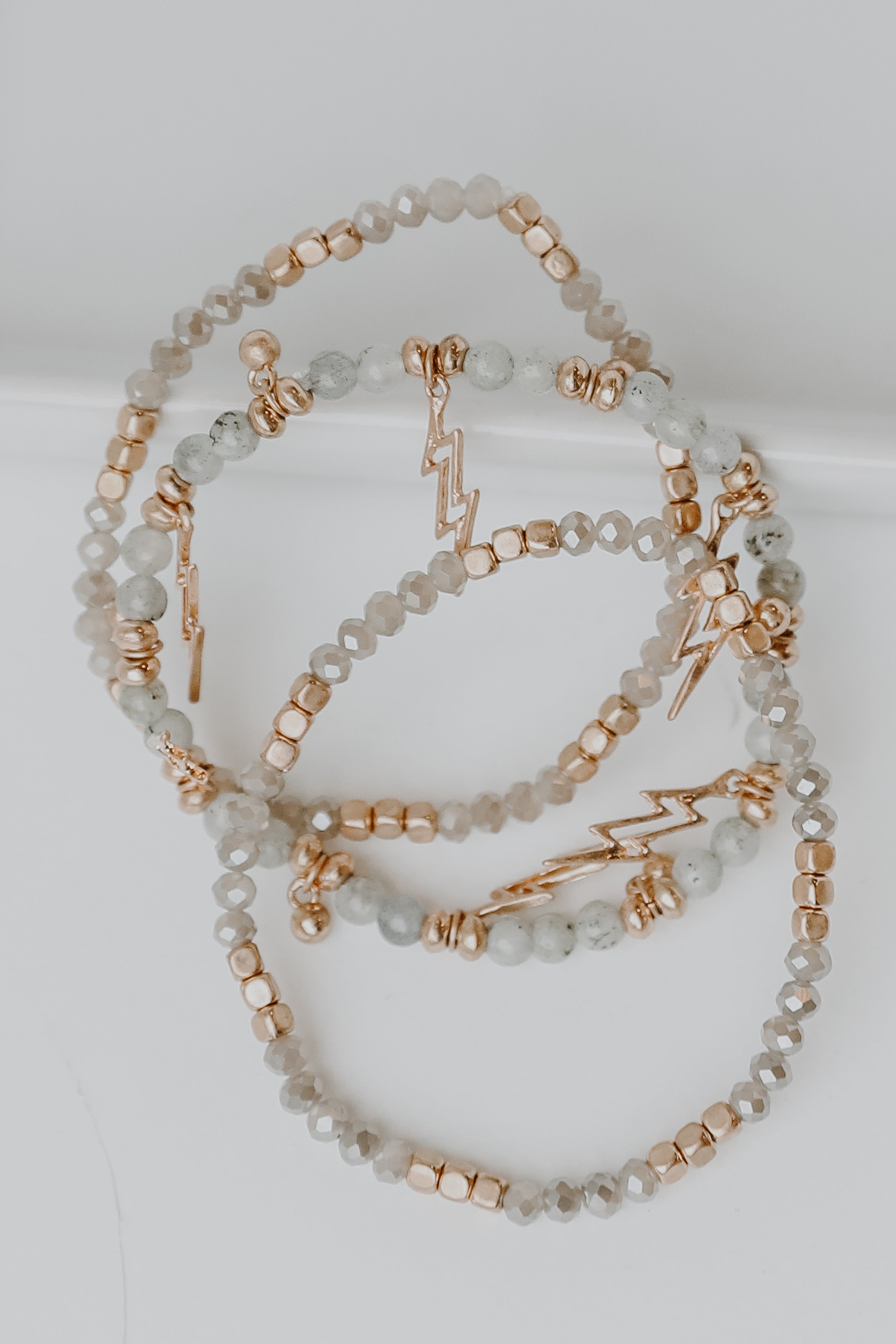 Beaded Lightning Bolt Bracelet Set in grey flat lay