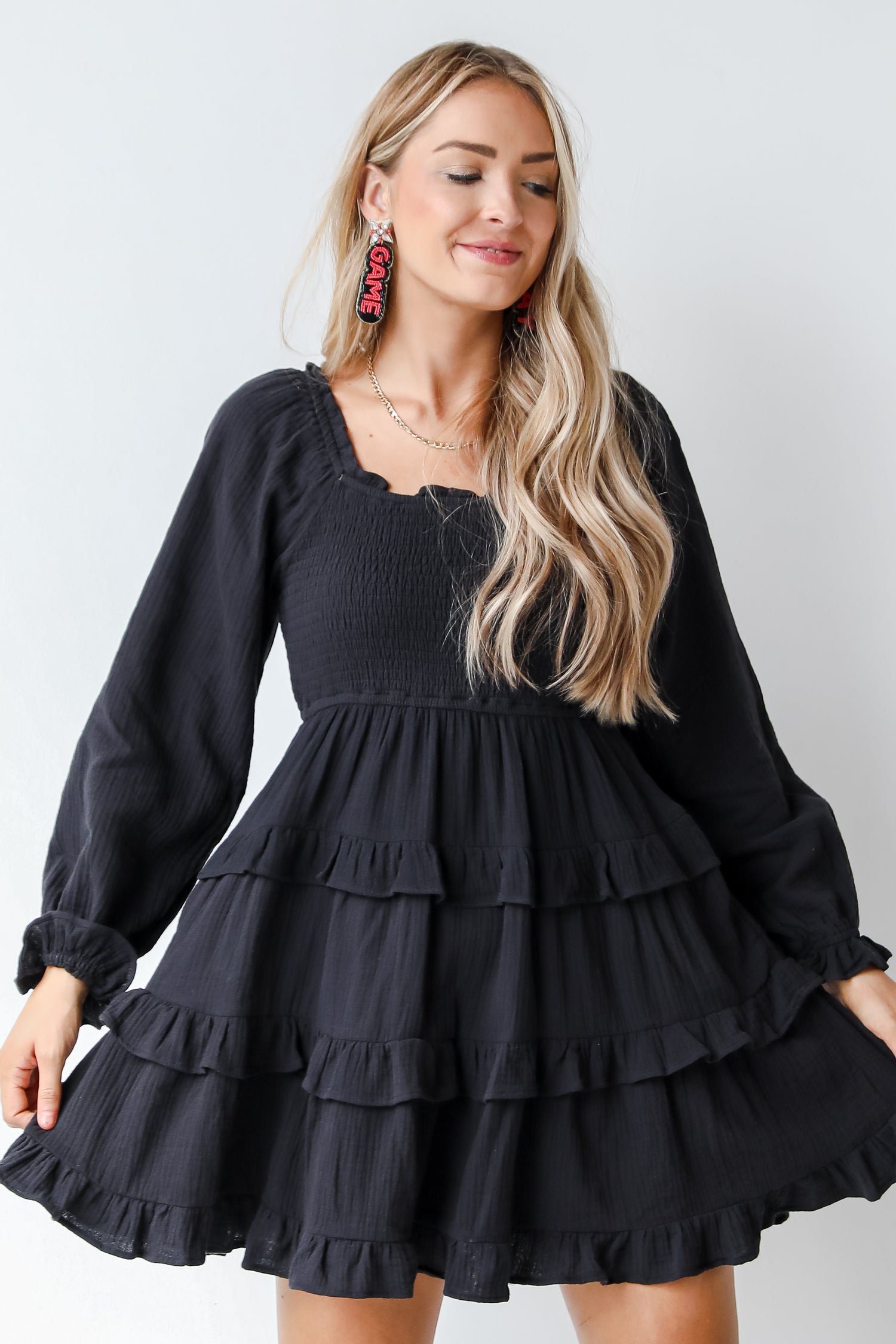 black tiered mini dress