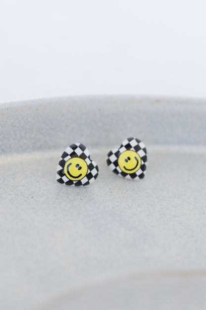 heart earrings in black flat lay