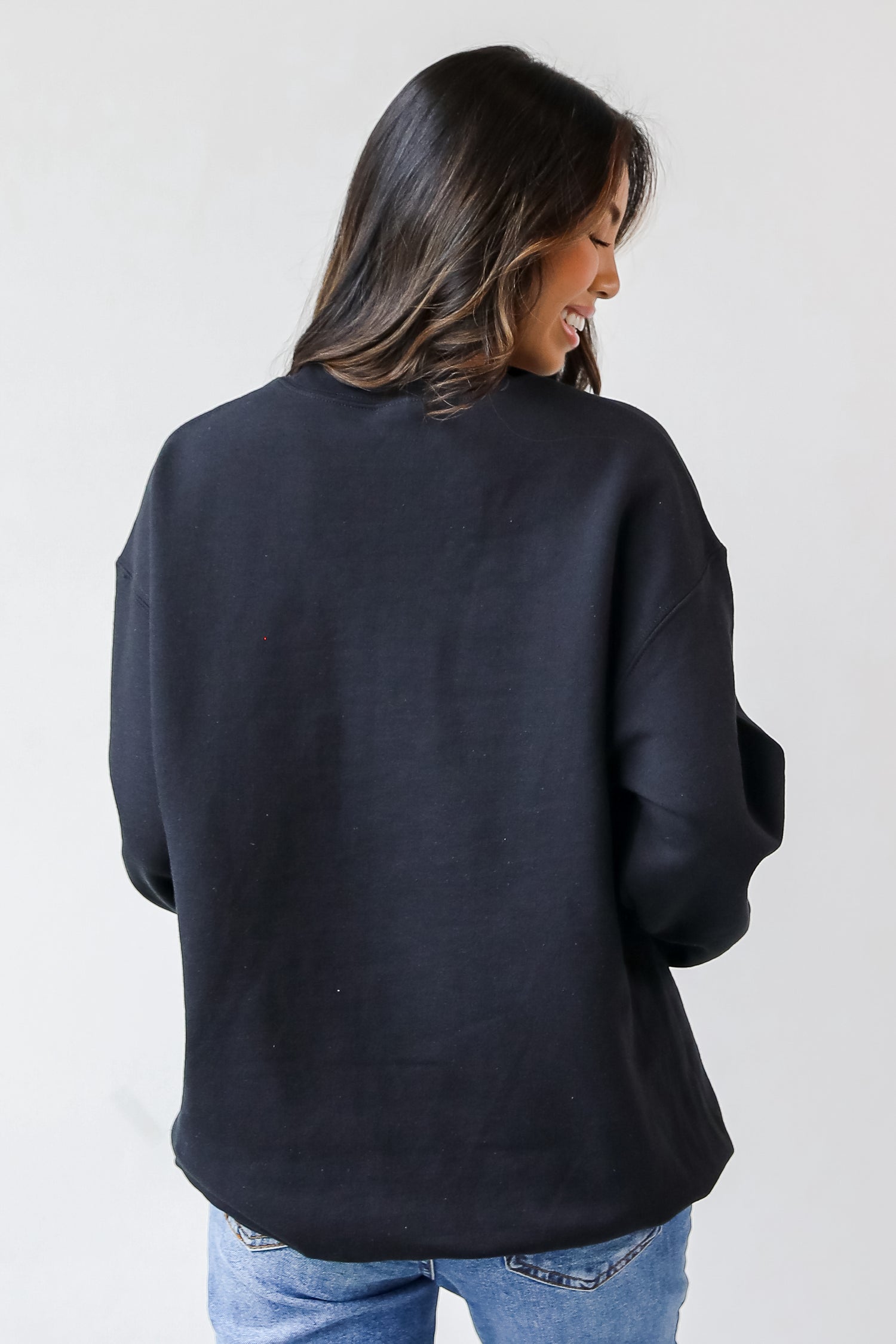 This comfy sweatshirt is designed with a soft and stretchy knit with a fleece interior. It features a crew neckline, long sleeves, a relaxed fit, and the words "Child Of God" on the front. 