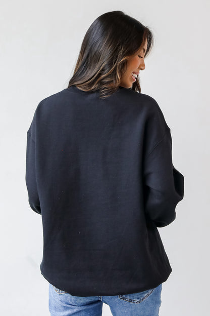 This comfy sweatshirt is designed with a soft and stretchy knit with a fleece interior. It features a crew neckline, long sleeves, a relaxed fit, and the words "Child Of God" on the front. 