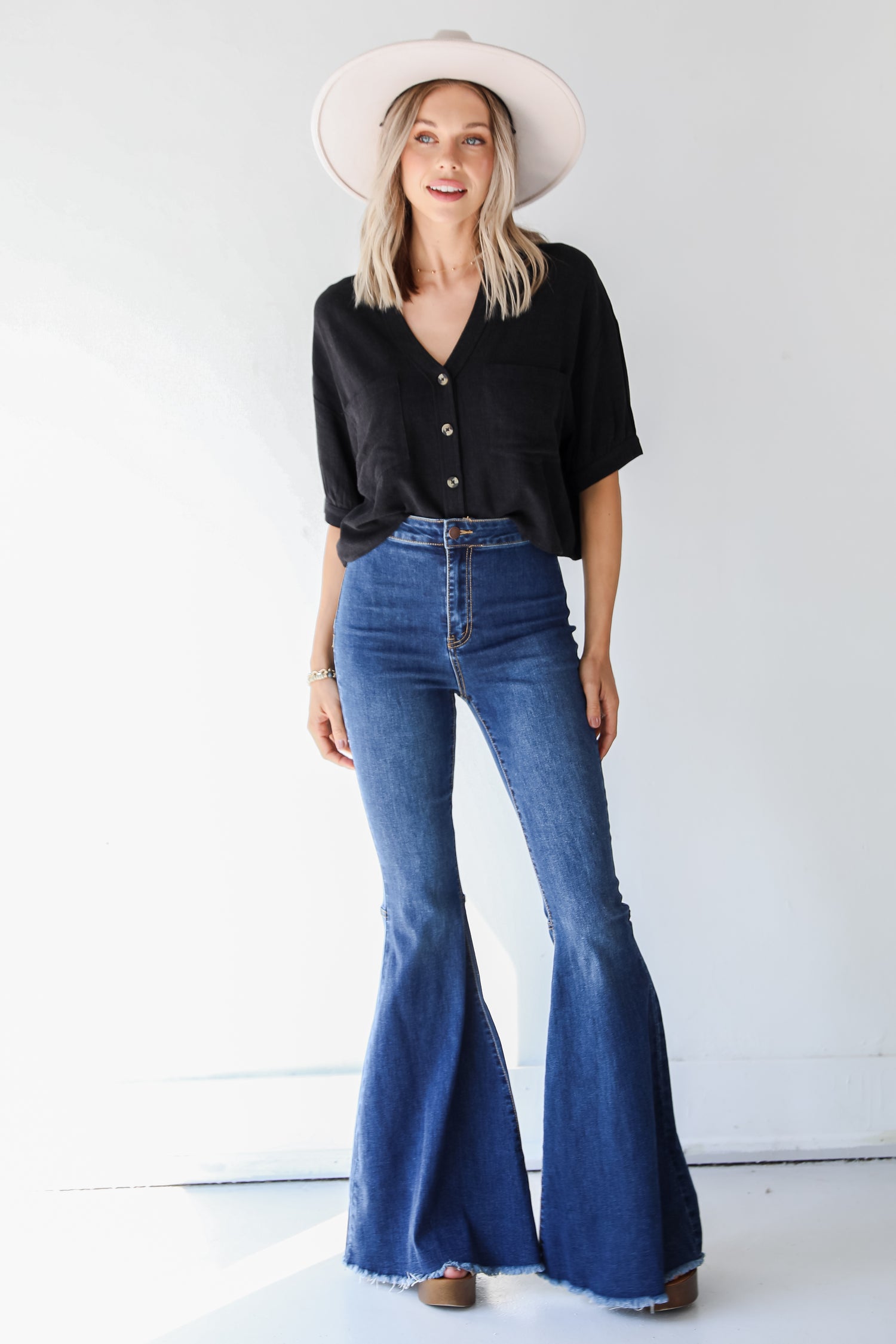 dark wash flare jeans on model